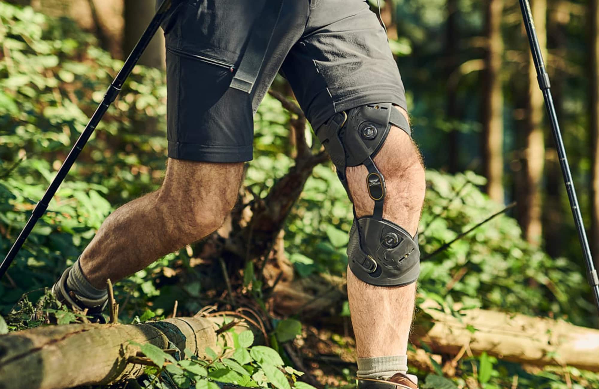 man wearing sports bracing on a hike