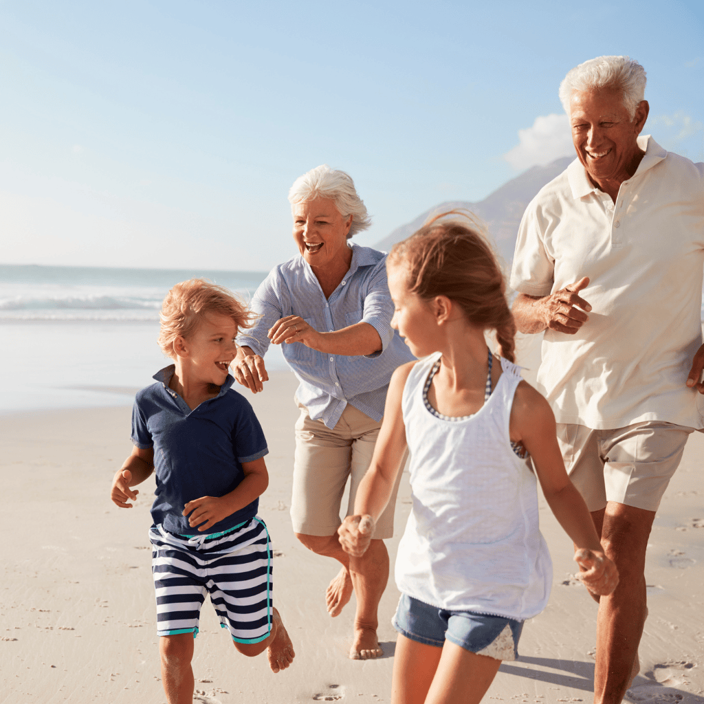 family walking beach